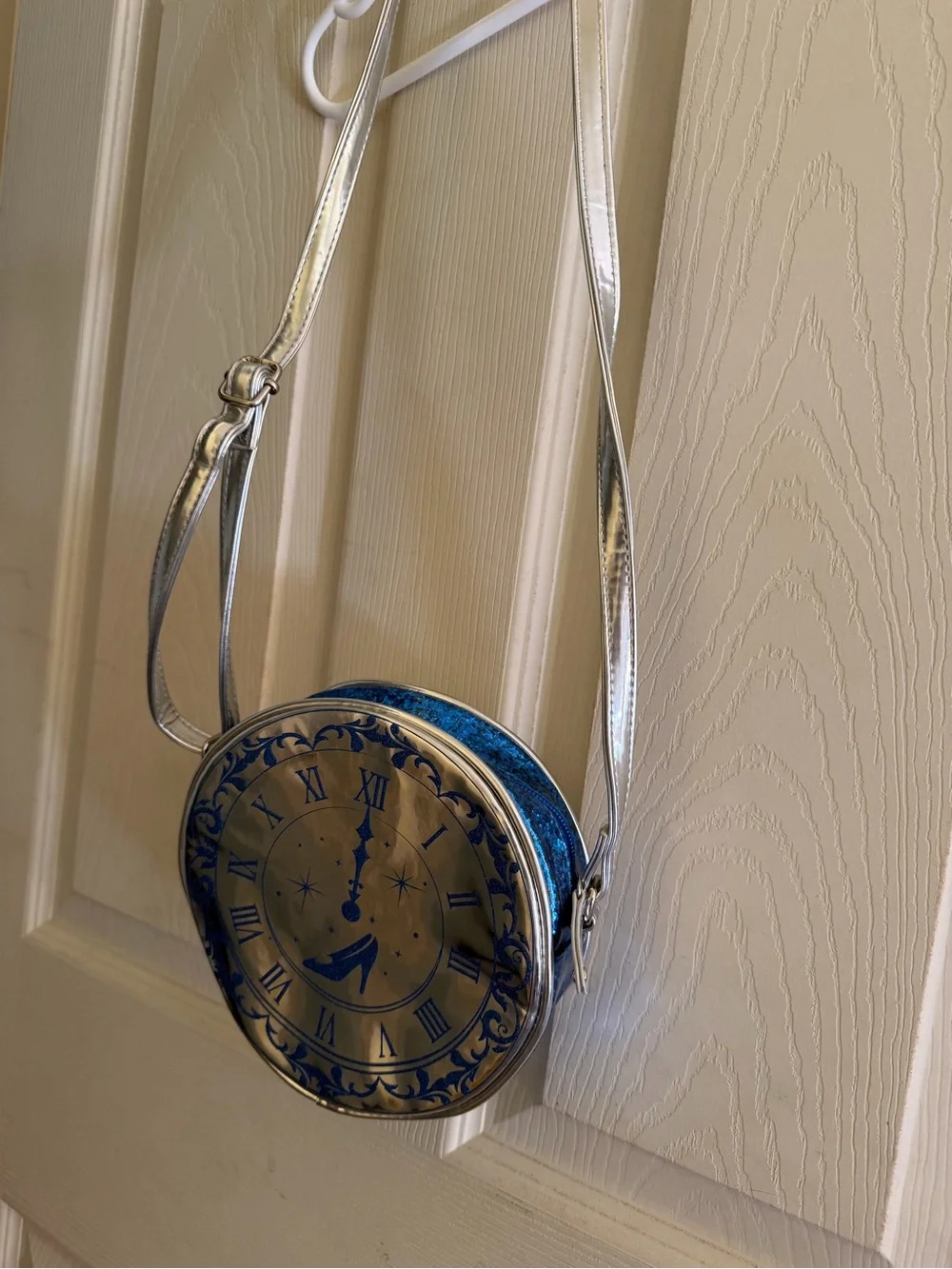 Disney Parks Silver Round Crossbody Bag with Blue Clock Motif